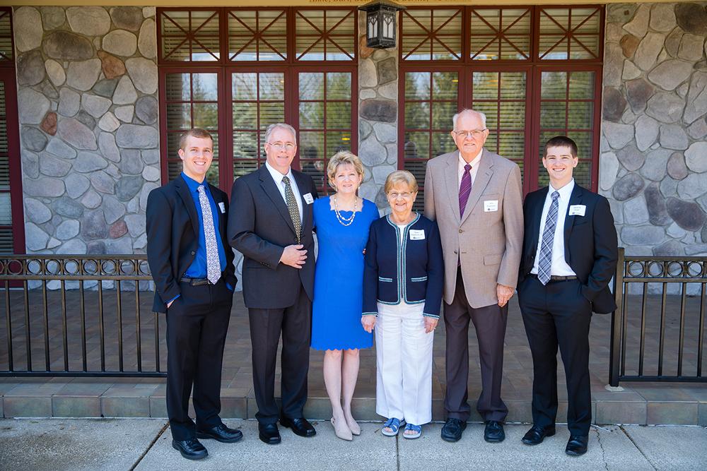 Distinguished Alumni with Family